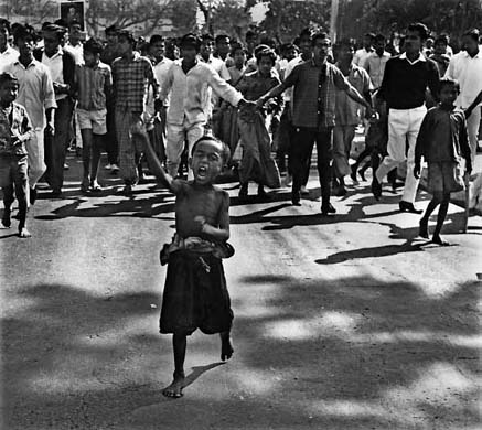 A child leads a street procession during the mass revolt of 1969 (Rashid Talukder/Autograph ABP)